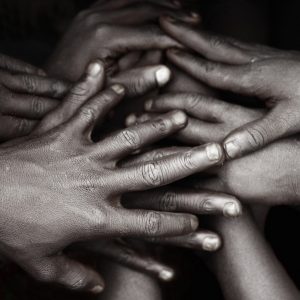 Group of Children’s Hands in Pile