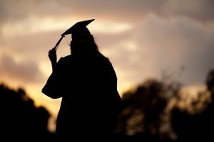 Silhouette Portrait of a graduate in cap and gown